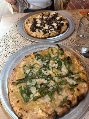 Funghi pizza (top) and Bianco pizza (bottom). at Humble Wood Fire Pizza in Gainesville