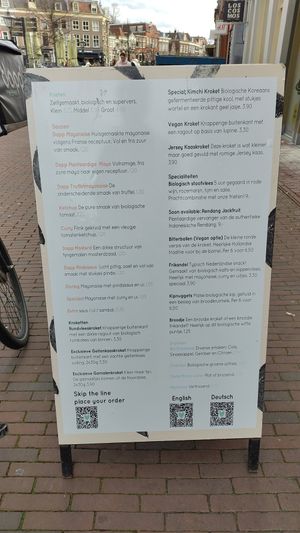 Menu board outside at Dapp Frietwinkel in Leiden