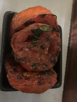 Grilled tomatoes  at MY.KA Cafe Mysore in Karnataka