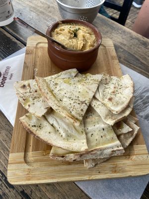 Homemade pita + hummus to share   at beertime in Athens