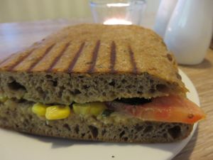 Grilled Vegan Sandwich (grilled red pepper, basil, sweetcorn, tomato slices, lettuce, and an amazing sweet mustard paté) at Dean & David - St Johanner Markt in Saarbrucken