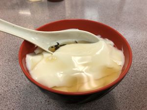 Plain tofu pudding with ginger syrup  at Excellent Tofu & Snacks in Richmond
