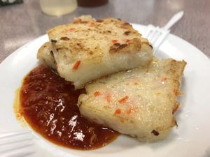 Radish cake with garlic chili sauce  at Excellent Tofu & Snacks in Richmond