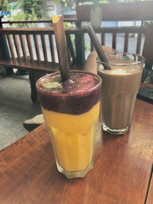 mango, banana & blueberry smoothie. chocolate & peanut butter shake.   at The Bagel in Koh Samui