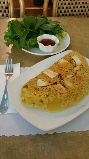 Vietnamese Sizzling Crepe with tofu, shrimp, bean sprouts, greens, and fish sauce at Veggie Today in Concord