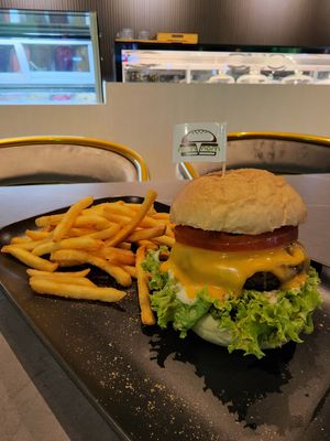 Portobello Burger comes with fries at nomVnom Cafe in Johor Bahru