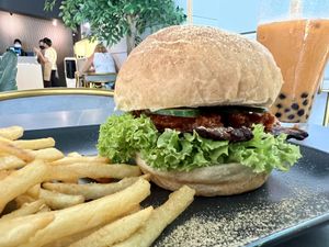 Burger and fries   at nomVnom Cafe in Johor Bahru