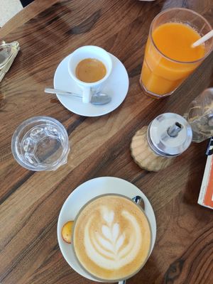 Oat latte, espresso, juice  at Alma Kitchen & Coffee in Tangier