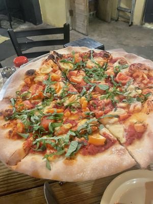   at Revolution Pizza Shop in Luquillo