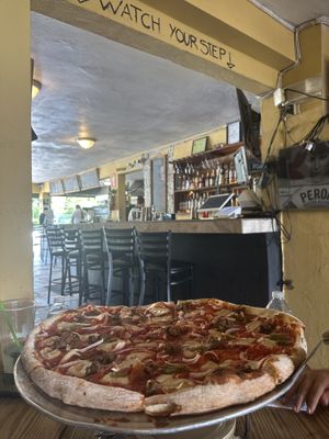   at Revolution Pizza Shop in Luquillo