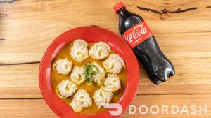 Saucy steam MOMO at Momo Central - Bourke St in Melbourne