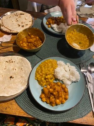 Dhal and chickpea curries, rice and roti   at Cumin in Siargao