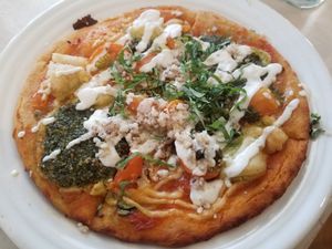 Pesto Pizza on Happy Hour Menu at Cafe Gratitude in Venice