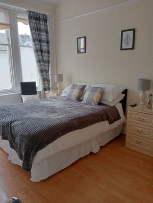 Part of the triple bedroom with ensuite. at Blaeberry House in Inverness