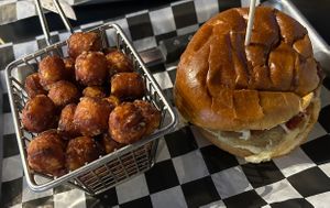 Vegan chik’n Parmesan sandwich with sweet potato tos   at Sebastian's Ale and Whiskey House in Lombard