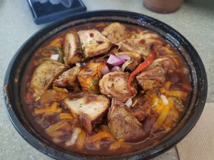 DETROIT CHILI CHEESE FRY - Hand-Cut Roasted Potato Medley, House Chili, Diced Red Onions, Choice of Cheese at The Detroit Pepper Company in Detroit