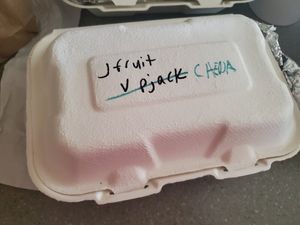 THE DETROIT STUFFED PEPPER - Brown rice and black beans, Detroit Pepper Red Sauce, and garlic seasonings, and your choice of cheese and meat. (used jackfruit and vegan cheddar) at The Detroit Pepper Company in Detroit