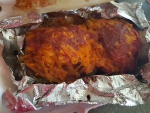 THE DETROIT STUFFED PEPPER - Brown rice and black beans, Detroit Pepper Red Sauce, and garlic seasonings, and your choice of cheese and meat. (used jackfruit and vegan cheddar) at The Detroit Pepper Company in Detroit