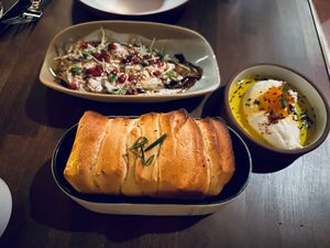 The fire-roasted eggplant and whipped "ricotta" with herb bread was a great start to the meal. at Anixi in New York City