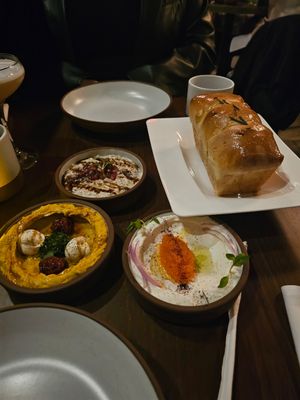 3 dip Mezze with layered herb bread at Anixi in New York City