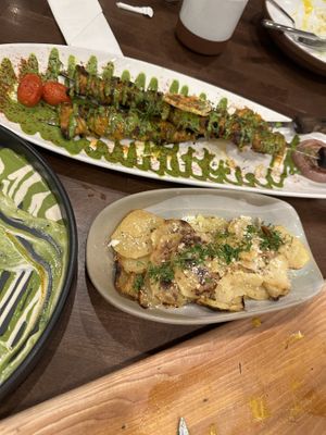 Chicken kabobs and confit potatoes  at Anixi in New York City