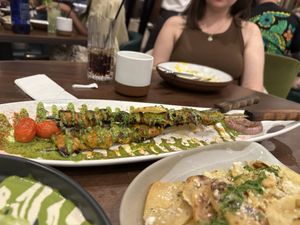 Chicken kabobs and confit potatoes  at Anixi in New York City