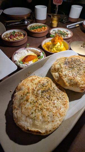 All 5 Dip Mezze $40
Includes choice of 2 housemade breads

Excellent and would order again at Anixi in New York City
