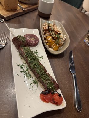 Grilled Steak and sweet potato side  at Anixi in New York City