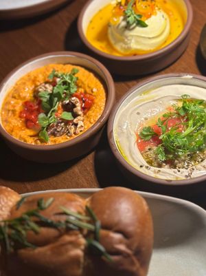 olive tahini, muhammara and whipped ricotta. All amazing! Whipped ricotta to die for. at Anixi in New York City