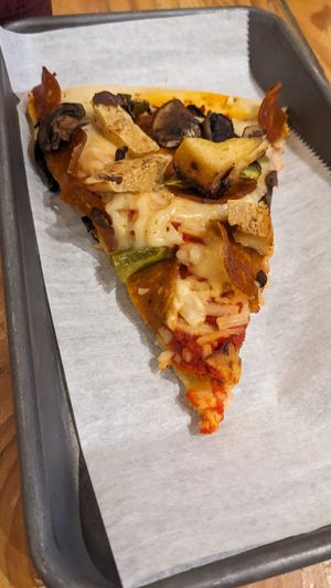 Vegan slice at West Wall in Seattle