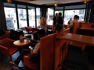 Place to sit indoor and outdoor, including spots to charge at Coffee Fellows - Schillerstraße in Munich