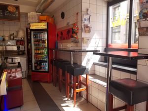 Minimal indoor seating at Bistro Krone Bar in Einsiedeln