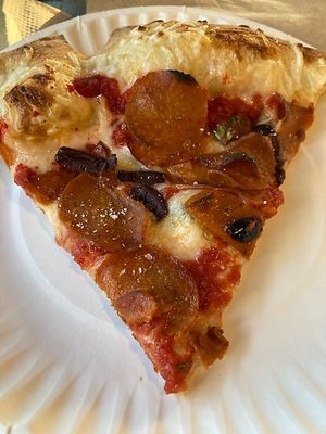 Served on paper plates  at Boom's Pizza in Lakewood