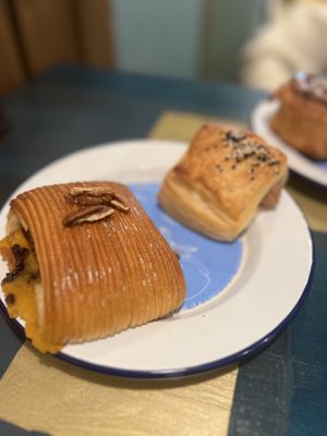 Pain suisse and vegan sausage   at British Patagonia in North London