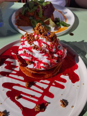 Pancakes with sour cherry red beets sauce, cream and amaranth crocant at Blumental in Berlin