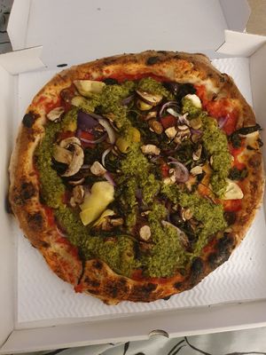 Pizz' and love - mushroom, onion, artichoke, olives, vegan pesto at Pizza Pilgrims in East London