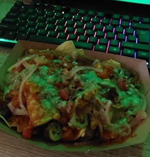 loaded nachos with chili veggie, pico de Gallo,  guacamole , jalapeños and pickled onion (no cheese) at Taco Mazama in Thessaloniki