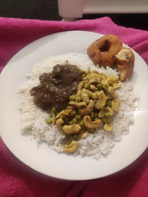 Chicken curry (left) and cashew and pea curry (right) at Little Lanka in Stockport