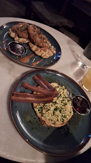 Chicken and waffles with biscoff sauce and bacon and tofu scramble pancakes at LD's Kitchen - The Black Heart in North West London
