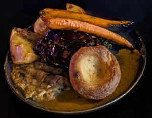 Sunday roast with "mocken". Roast potatoes outstanding, gravy incredible, and the two (two!) carrots were great. "Mocken" was a bit meh, Yorkshire pudding was undercooked in the middle, and the veggies kinda slimed into each other. £18 worth? Just. at LD's Kitchen - The Black Heart in North West London