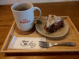 A not-so-full cup of bad coffee and a stodgy carrot cake :( at Ovgo Baker - Nijo St in Kyoto
