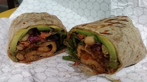 Haven's Wrap is a vegan choice at Sissy's, with garbanzo beans, tempeh, sunflower seeds, carrots, red cabbage, and  more, along with  tahini. Seen in foil wrapping. June 2021. at Sissy's Cafe in Kingston