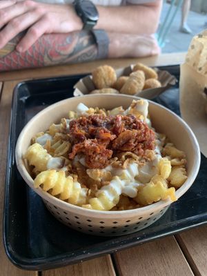 Loaded sundried tomato fries.  at Swing Kitchen in Munich