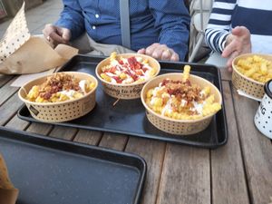 Garlic fries & other fries. at Swing Kitchen in Munich