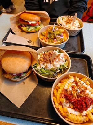 Try Garlic and Greek fries! Its a must! at Swing Kitchen in Munich