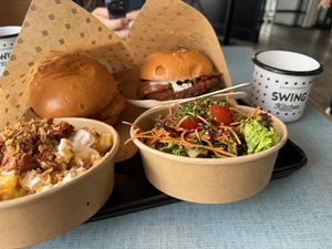 Vienna burger,  bacon burger. Garlic fries. No plastic, love it!  at Swing Kitchen in Munich