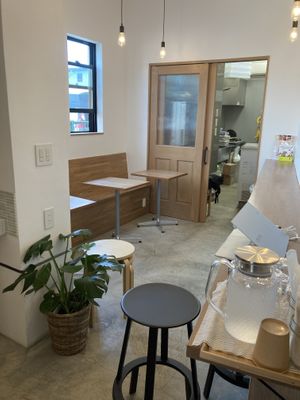Small seating area  at Cafe Stand Blossom in Kamakura