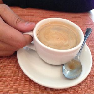 Black coffee with soy milk at Avalon in Ghent