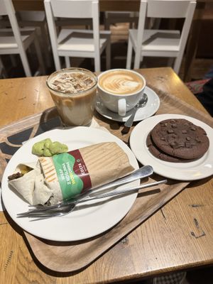 Beef wrap, Oat iced latte, Oat cappuccino and Chocolate cookies   at Costa Coffee in Krakow