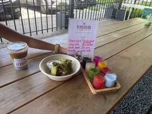 Burrito and a juicy flight!  at Revolucion Coffee and Juice in San Antonio